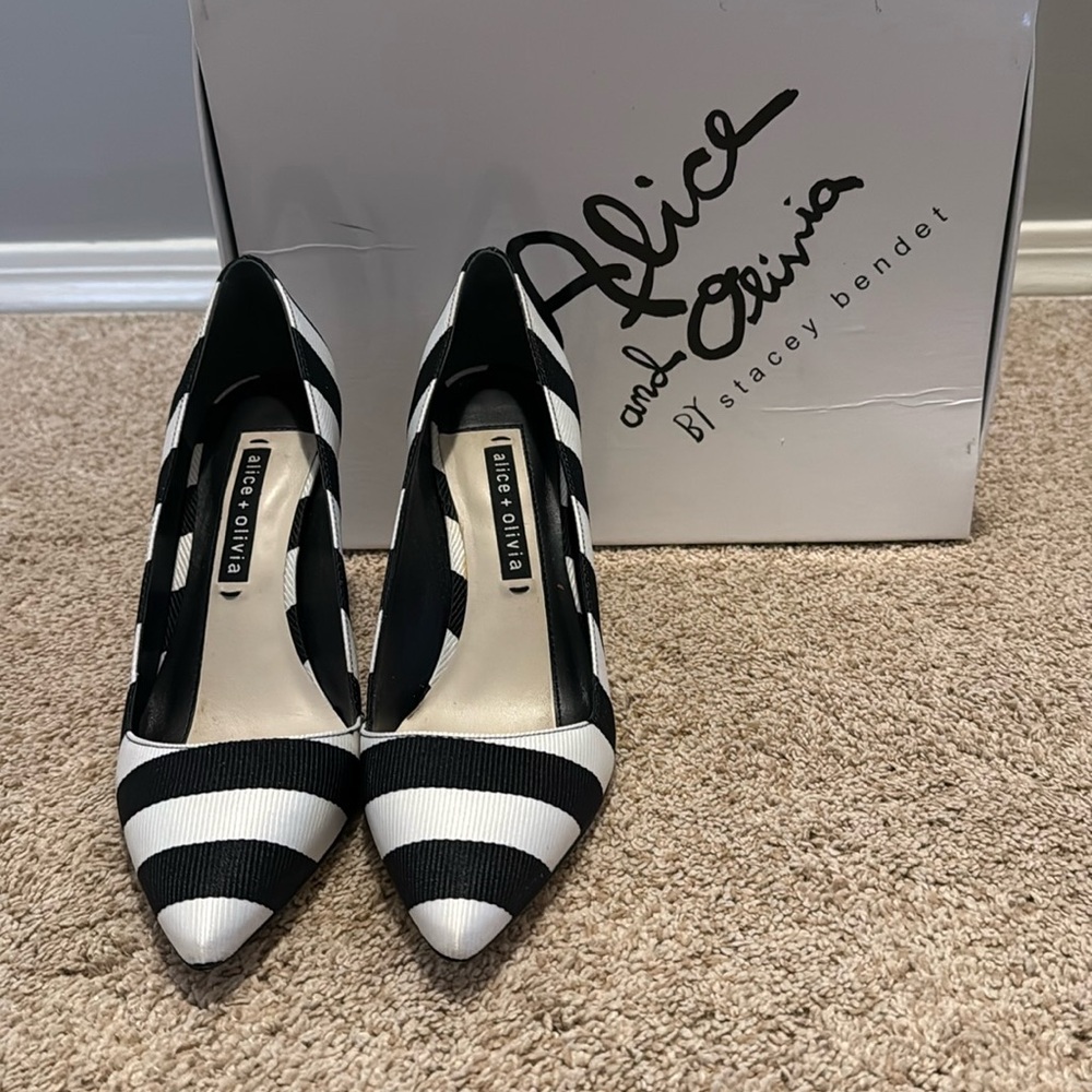 Black and white stripe pumps